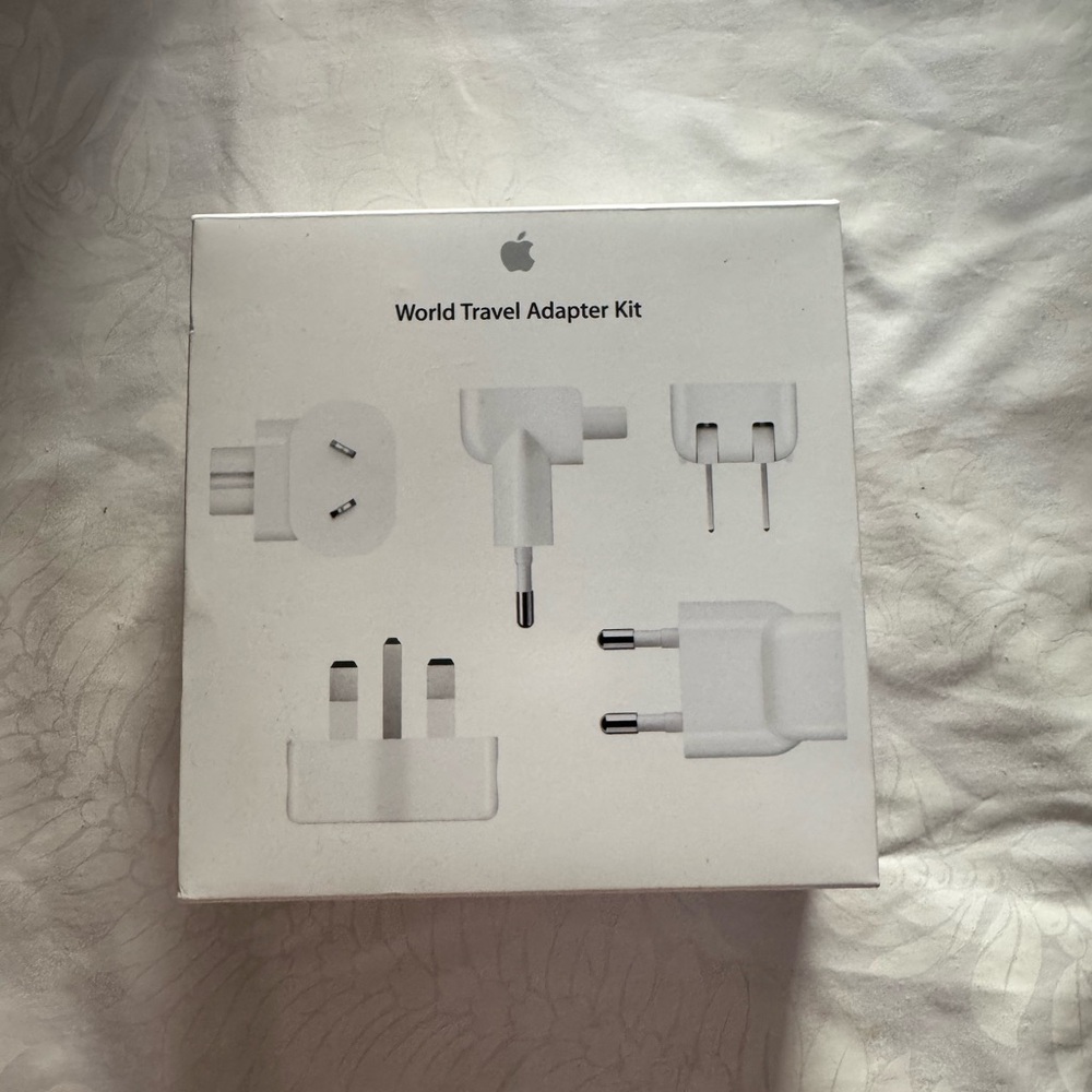 Brand New never usednor open. Apple World Travelers Set